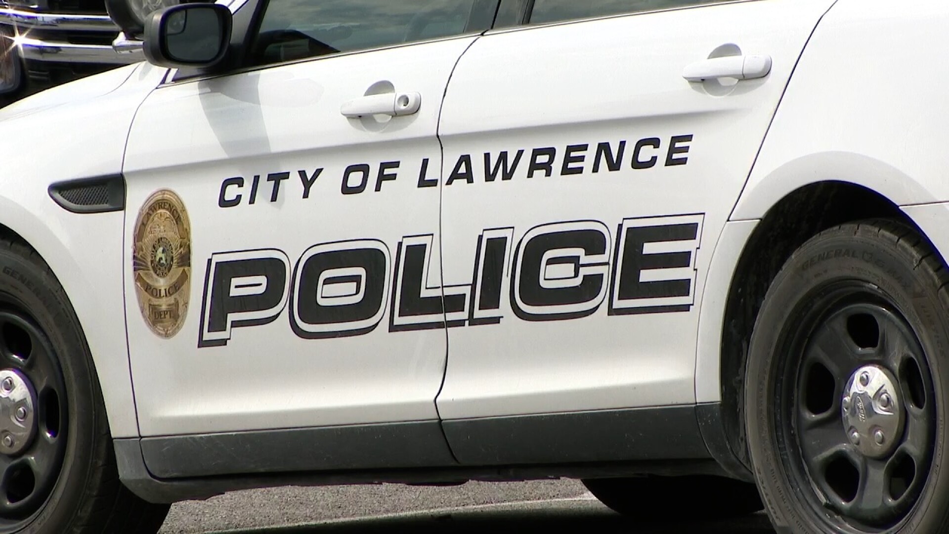lawrence police cuts 2.jpg